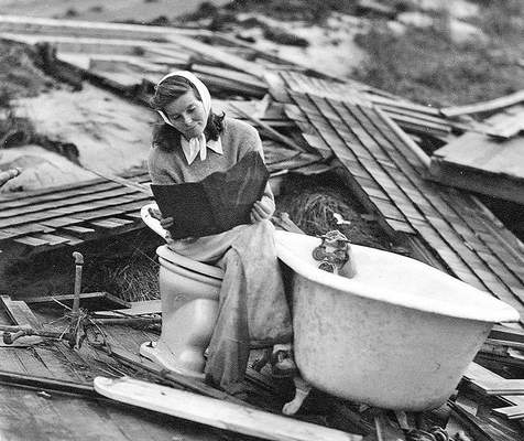 Katharine-Hepburn-amid-the-remains-of-her-home-in-Old-Saybrook-after-the-Hurricane-of-38.